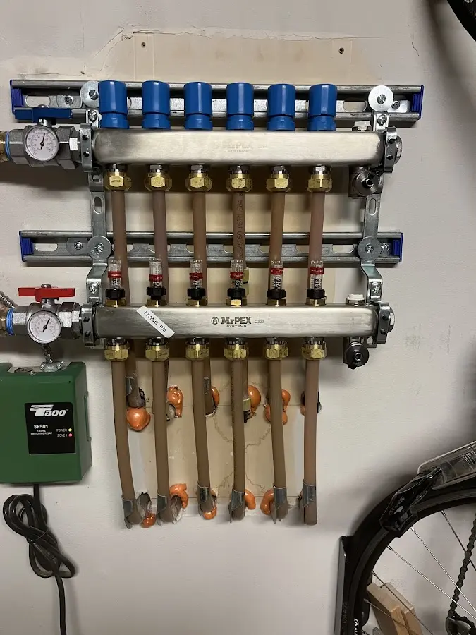 Plumber performing Gas Leak Detection at a residential property in Mechanic Falls